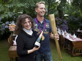 Elizabeth and Karl Hester with Olympic torch
